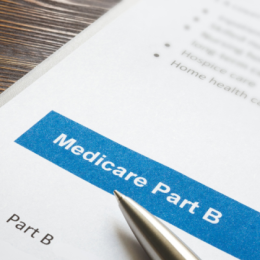 Image of Medicare Part B document with pen