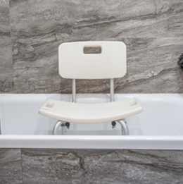Bath transfer bench in a tub in a bathroom at someone's home