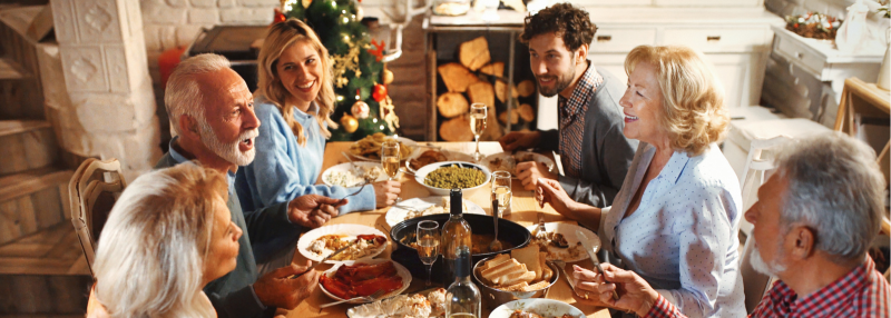 Family gathered around the table for holidays